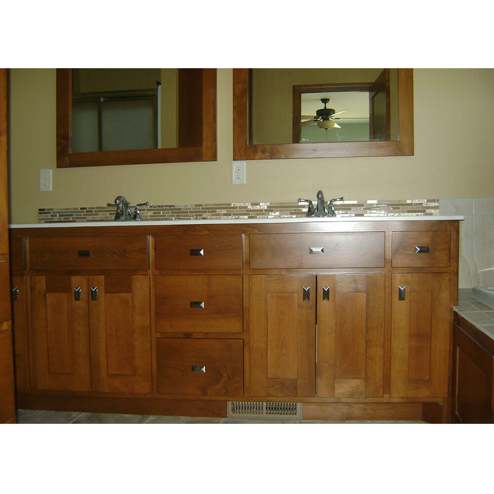 Large dual sink with tan brick backsplash