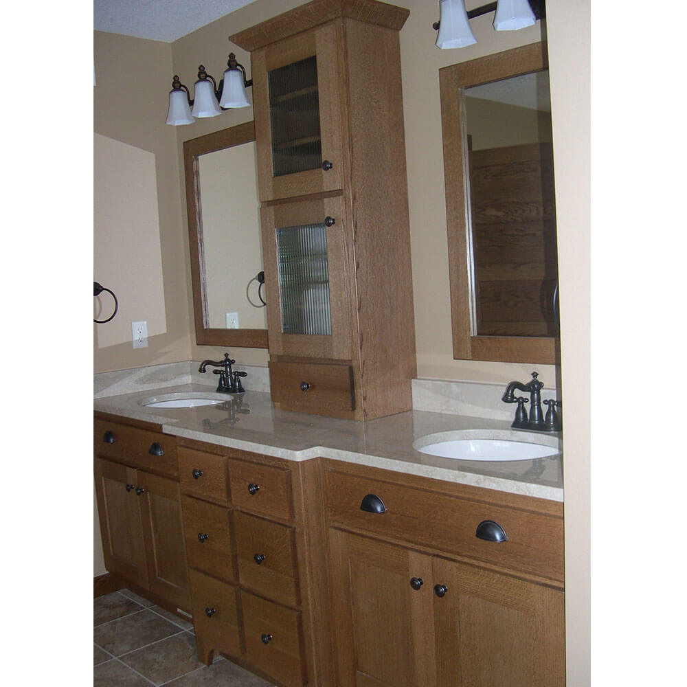 Beige colored bathroom with two sinks