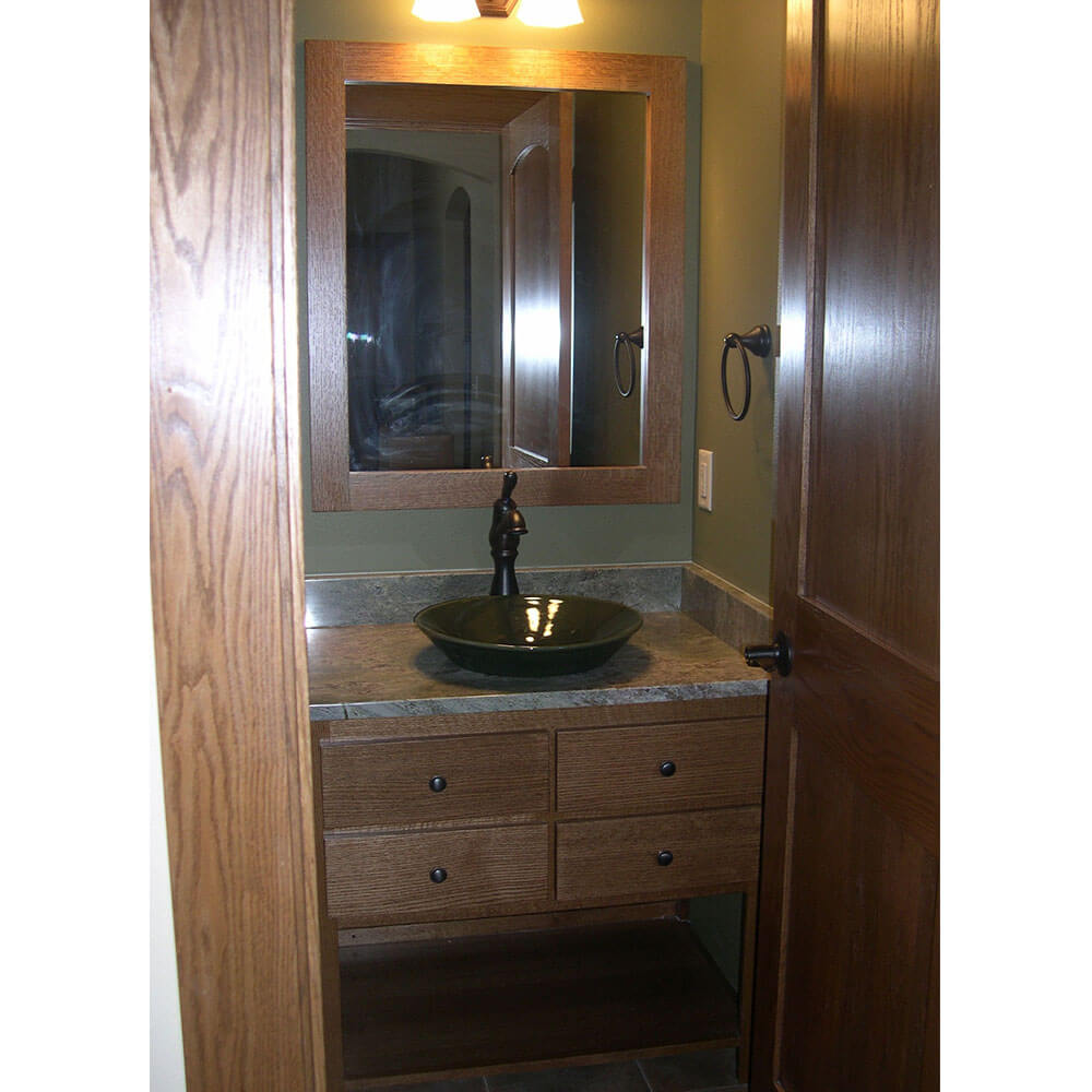 Black bowl sink with a gray countertop